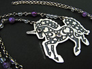 Silver, amethyst and quartz unicorn pendant decorated with triple moons, stars and hearts