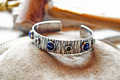 Silver tree bark cuff with lapis and jade