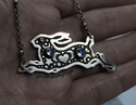 Silver celestial leaping hare with blue moonstone