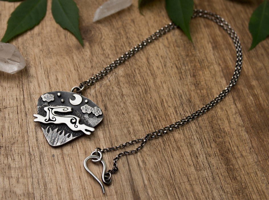 Silver leaping hare necklace
