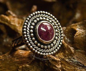 Boho silver and ruby ring