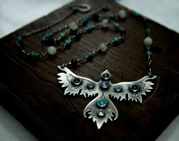Sterling silver and gemstone raven pendant