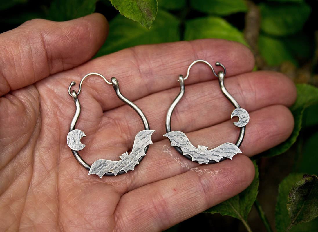 Bat silver earrings