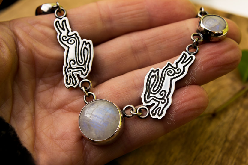Silver leaping hare necklace
