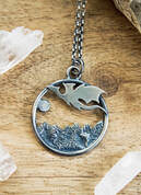 Silver dragon pendant