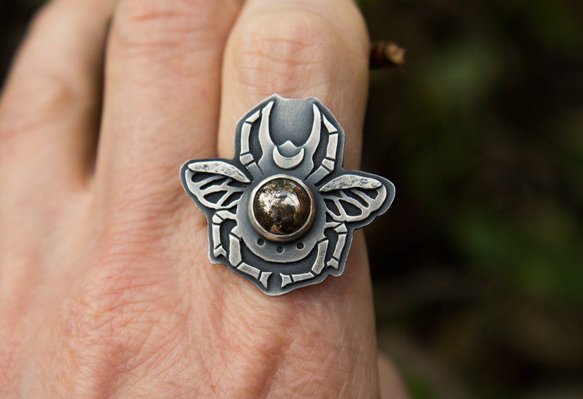 Silver insect ring with pyrite