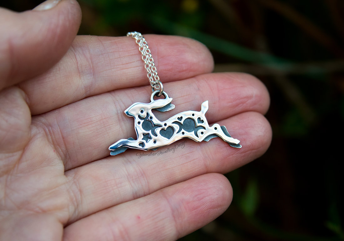 Leaping hare silver necklace with triple moons