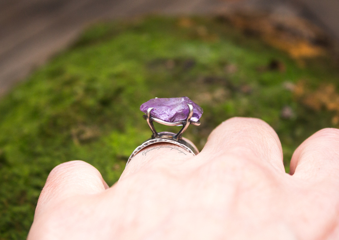 Large amethyst and silver ring